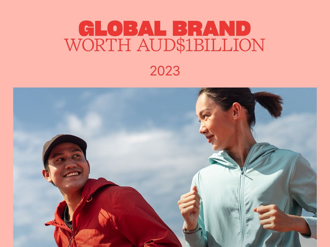 Two people running outdoors with a pink border and with text reading "Global brand worth $1 Billion AUD 2023"