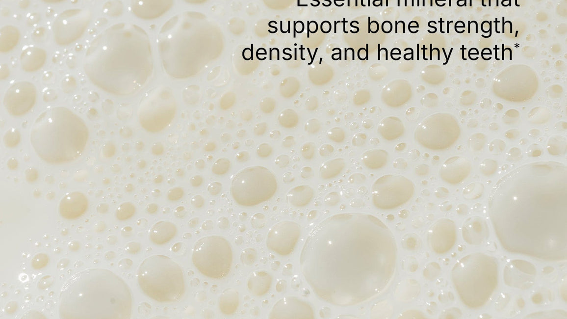 Bubbly white background with text reading ‘Calcium’ and ‘Essential mineral that supports bone strength, density, and healthy teeth.’